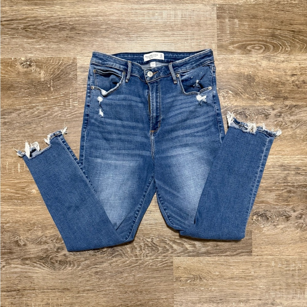 Distressed Blue Denim Jeans
